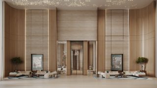 spacious elegant lobby with glass doors and seating
