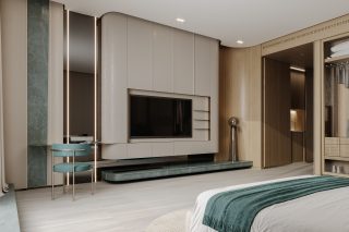 stylish bedroom with teal chair and wall mounted tv