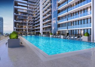 modern residential pool area with lounge chairs