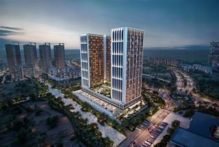 illuminated modern high rise building at dusk city view