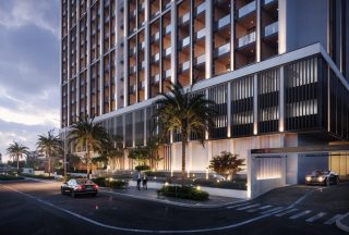 modern high rise residential building with glass and metal facade