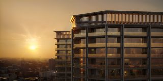 modern residential building balconies at sunset