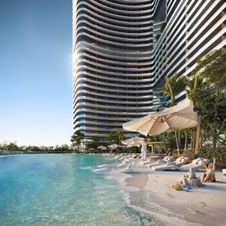 modern residential building with wavy balconies and beach lounge