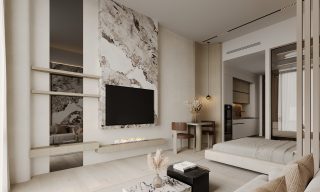 modern studio apartment living area with sofa tv and dining nook