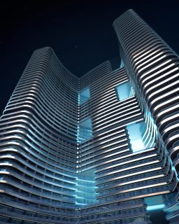 night view of modern curved binghatti hills building