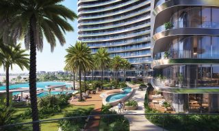 modern residential building with pools and palm trees