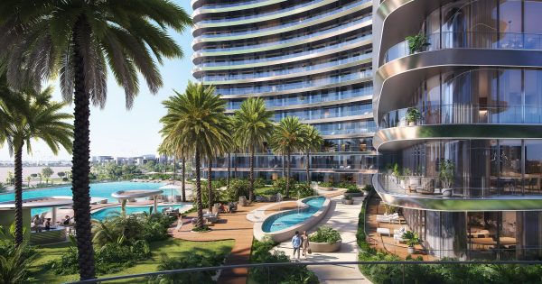 modern residential building with pools and palm trees