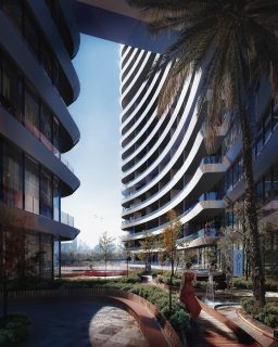 modern building with curved balconies and landscaped gardens