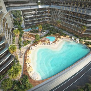 curved outdoor swimming pool with lounge chairs