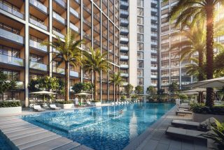 modern residential pool with loungers and balconies