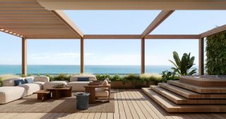 rooftop terrace with jacuzzi seating ocean view