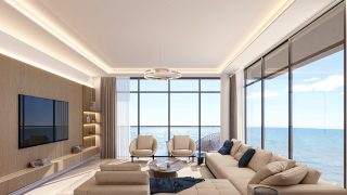 bright living room with sea and city skyline views