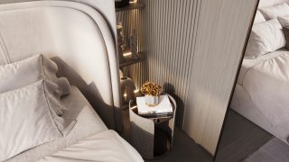 modern bedroom corner with plush bedding bedside table flowers