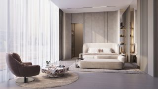 bright modern studio bedroom with white bed and armchair