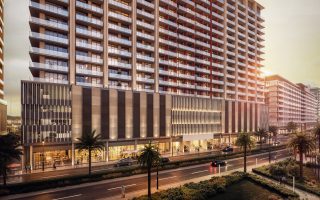 modern ruby apartments building with crimson gold facade
