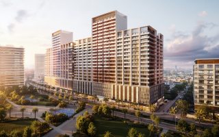 high rise ruby apartments with crimson gold facade