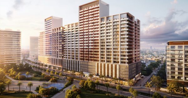 high rise ruby apartments with crimson gold facade