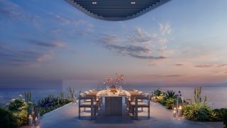 rooftop dining area with ocean and bay views