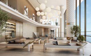 pilates studio with reformers and large windows