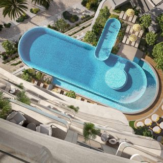 aerial view of elegant outdoor pool and relaxation area