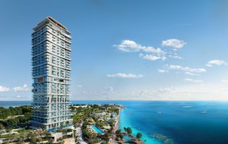 modern high rise building with pool and ocean views
