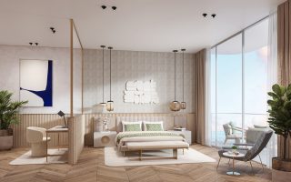 luxury master bedroom with ocean and city views