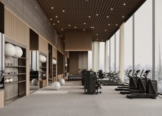 modern gym with cardio machines and city skyline