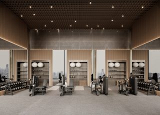 interior view of gym with weights and dubai skyline
