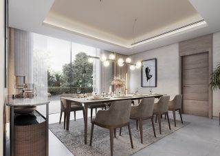 light filled dining room with wooden table and nature view